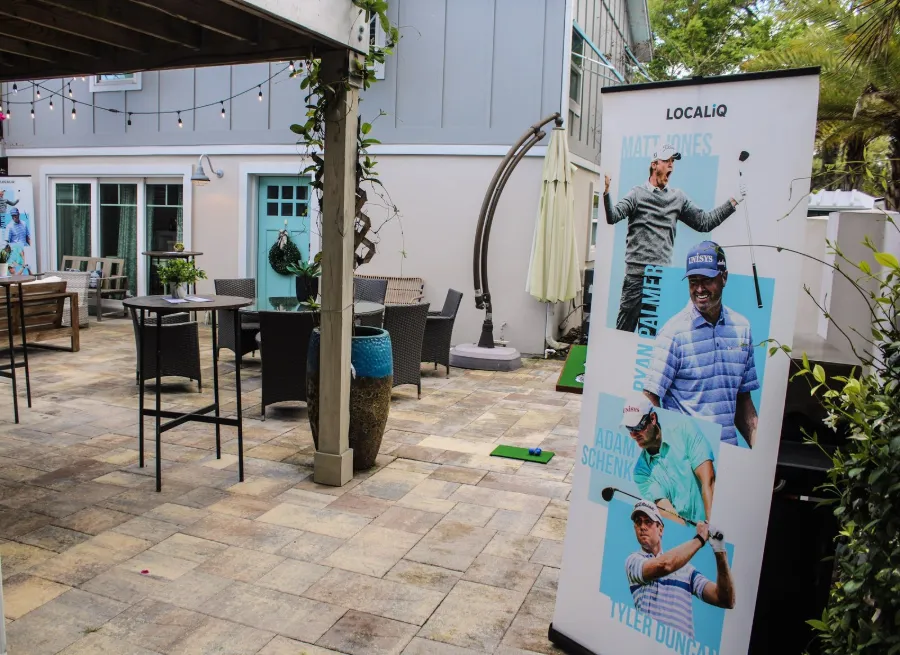 An outdoor patio set up for a catered event
